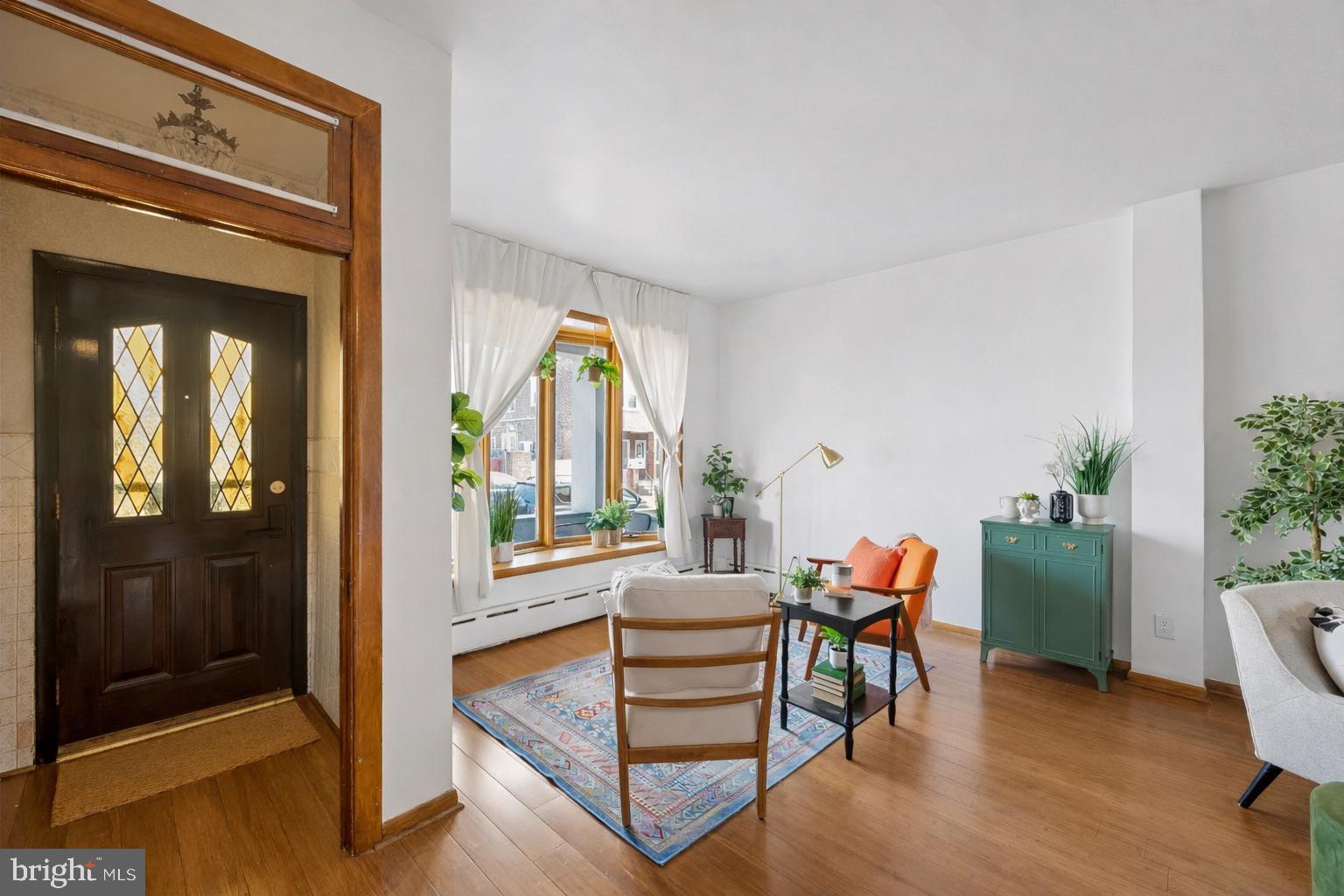 3346 Edgemont Street Philadelphia, PA 19134 - Photo 5 of 25 a living room with furniture and a window