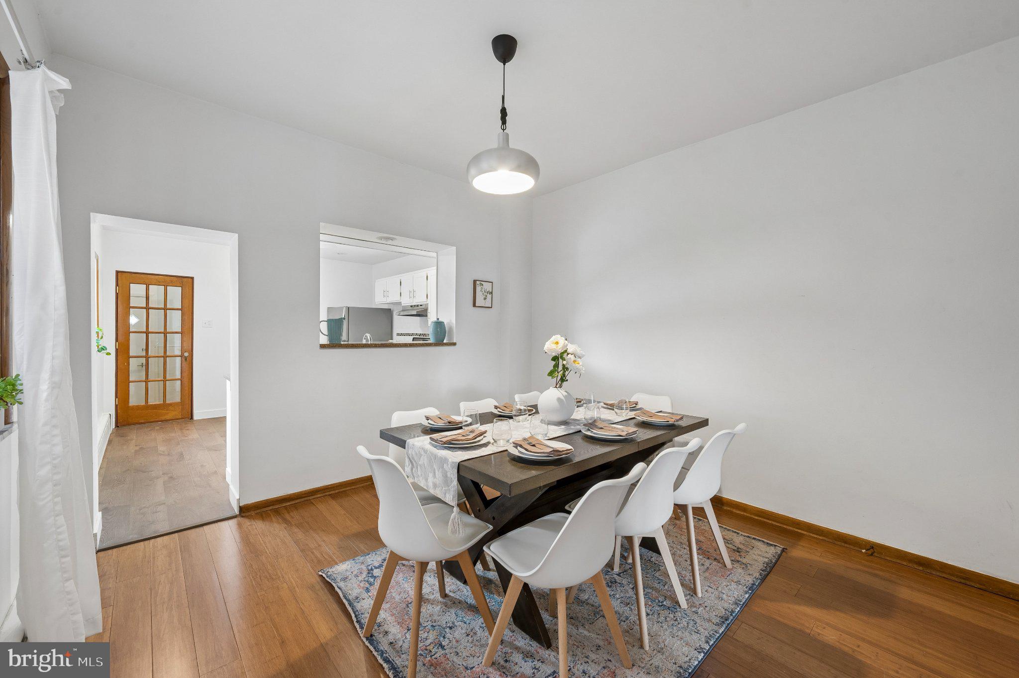 3346 Edgemont Street Philadelphia, PA 19134 - Photo 10 of 25 a view of a dining room with furniture and wooden floor