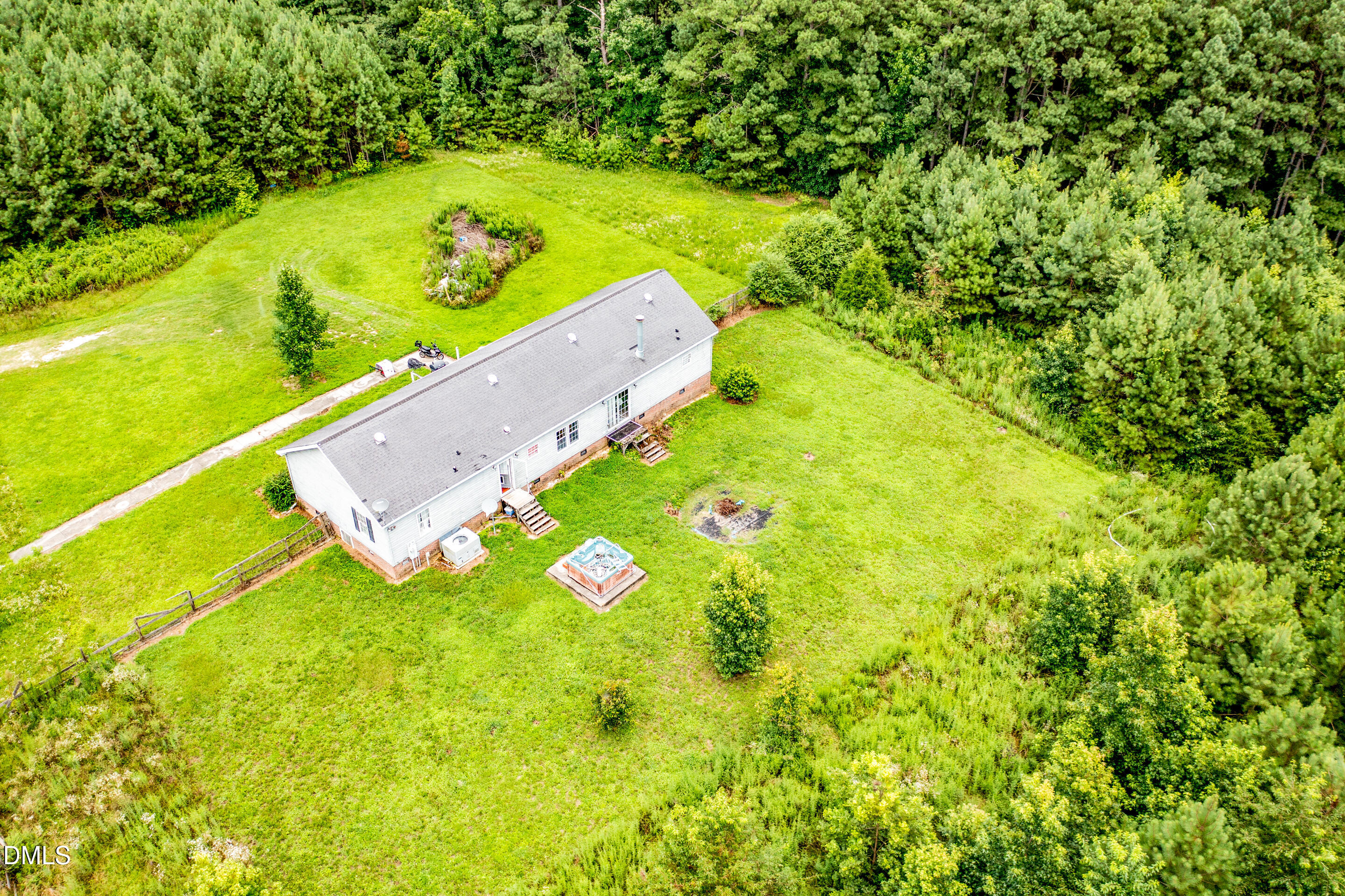 240 Clarence Alston Road Franklinton, NC 27525 - Photo 4 of 8 a view of a yard with an outdoor space