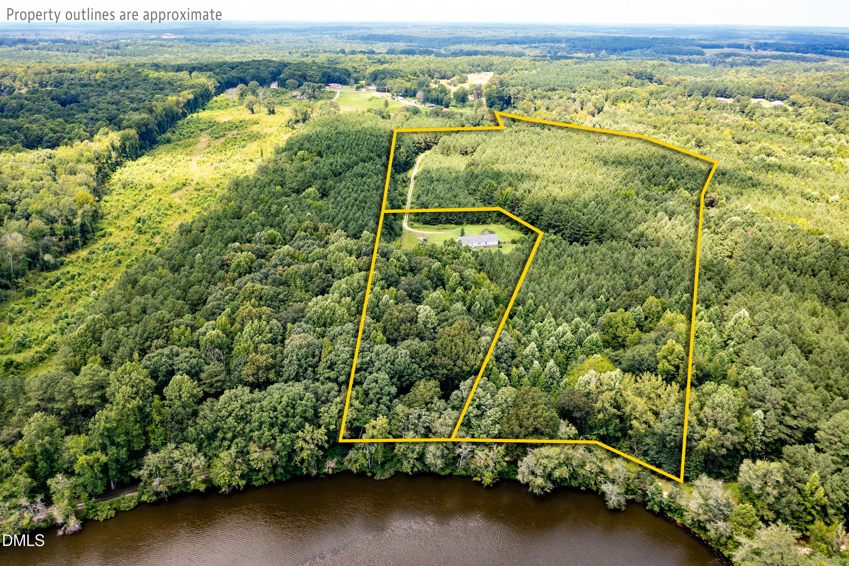 240 Clarence Alston Road Franklinton, NC 27525 - Photo 5 of 8 an aerial view of residential houses with outdoor space and trees