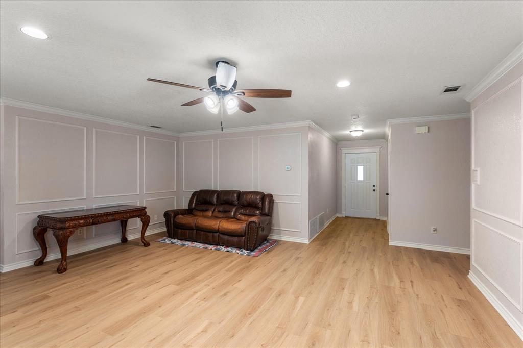 116 Meadowood Road Enchanted Oaks, TX 75156 - Photo 17 of 37 Spacious interior featuring wood-finish flooring, recessed lighting, and a ceiling fan