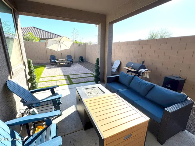 a kitchen with a refrigerator a stove top oven a sink and dishwasher