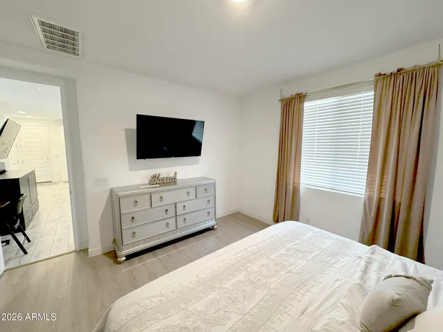 a view of living room with furniture and a window