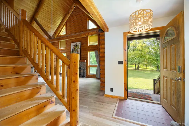 a view of kitchen with furniture and a fireplace