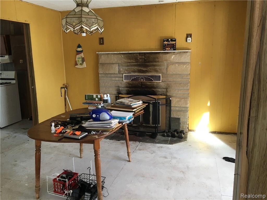 4521 South Lake Shore Road Harbor Beach, MI 48441 - Photo 10 of 14 There is a fireplace dining room