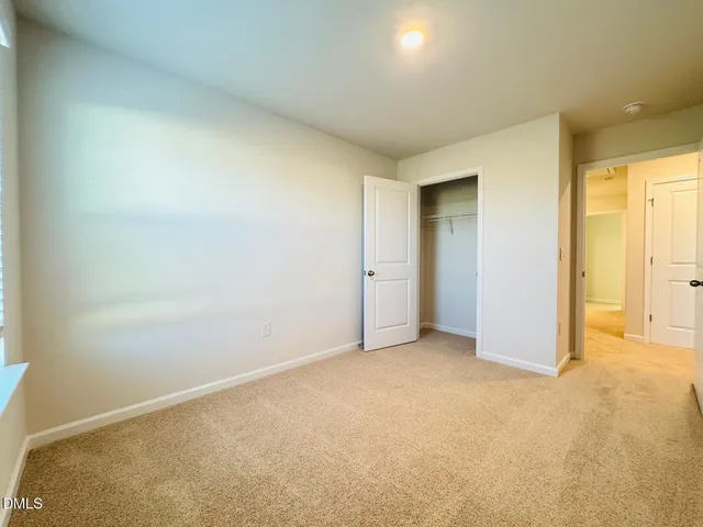 an empty room with a natural light