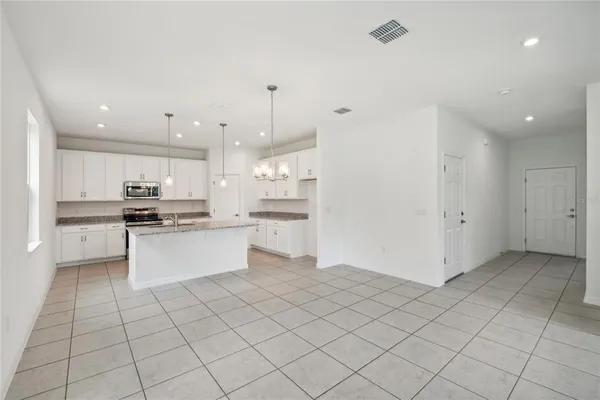 $391,990 | 12807 Trovita Drive, Grand Island, FL 32735