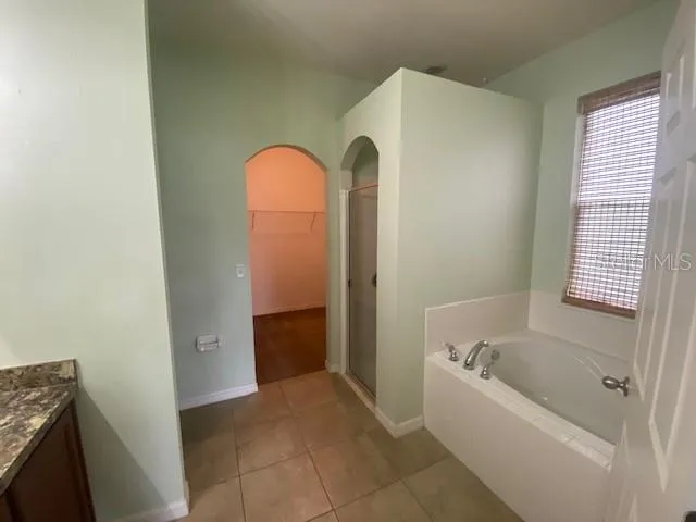a bathroom with a bathtub