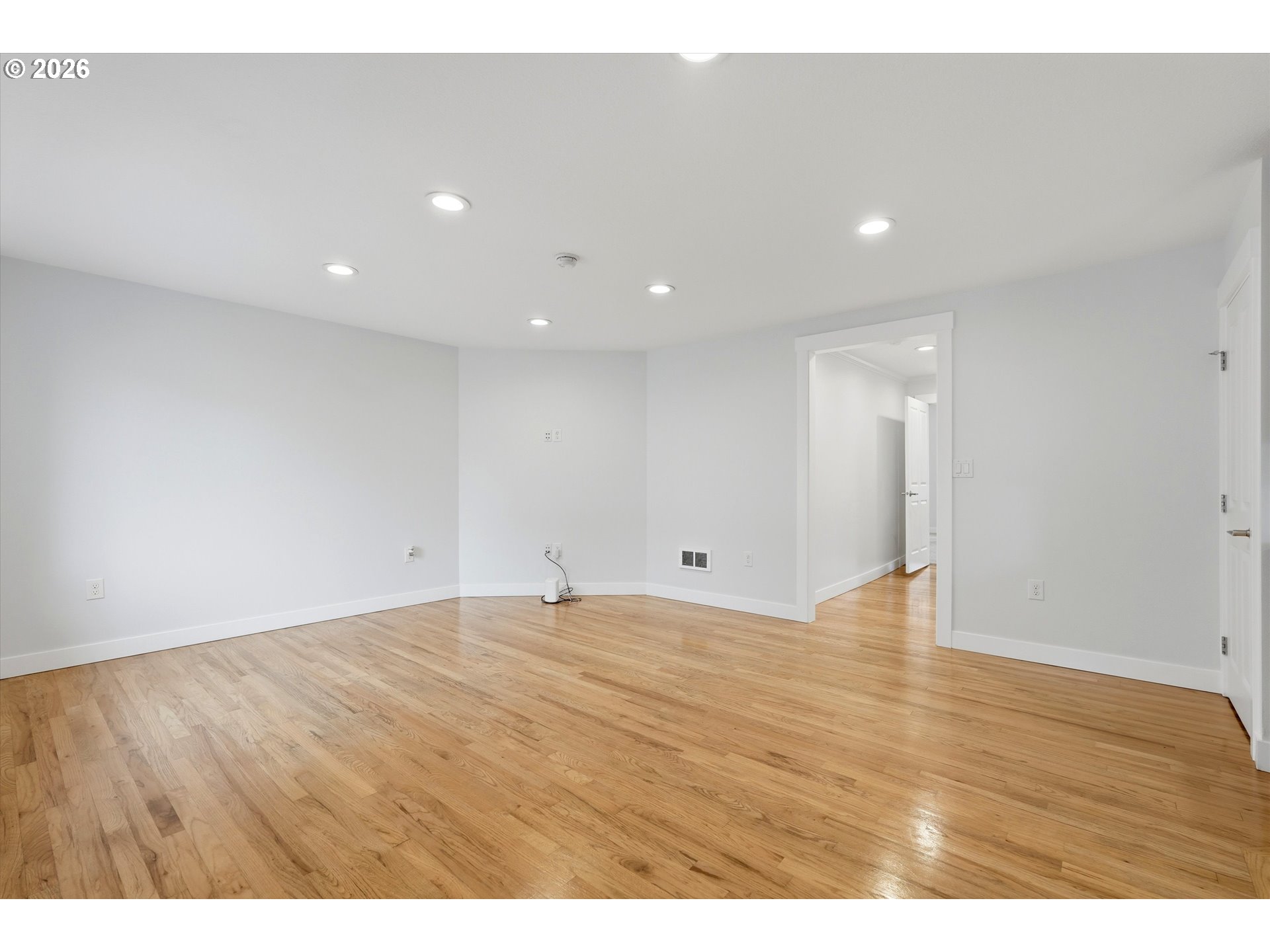 4621 Ohio Street Longview, WA 98632 - Photo 7 of 29 a view of an empty room with wooden floor