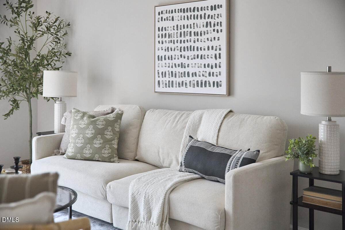 638 Cupola Drive Raleigh, NC 27603 - Photo 19 of 43 a bed room with a bed and a couch