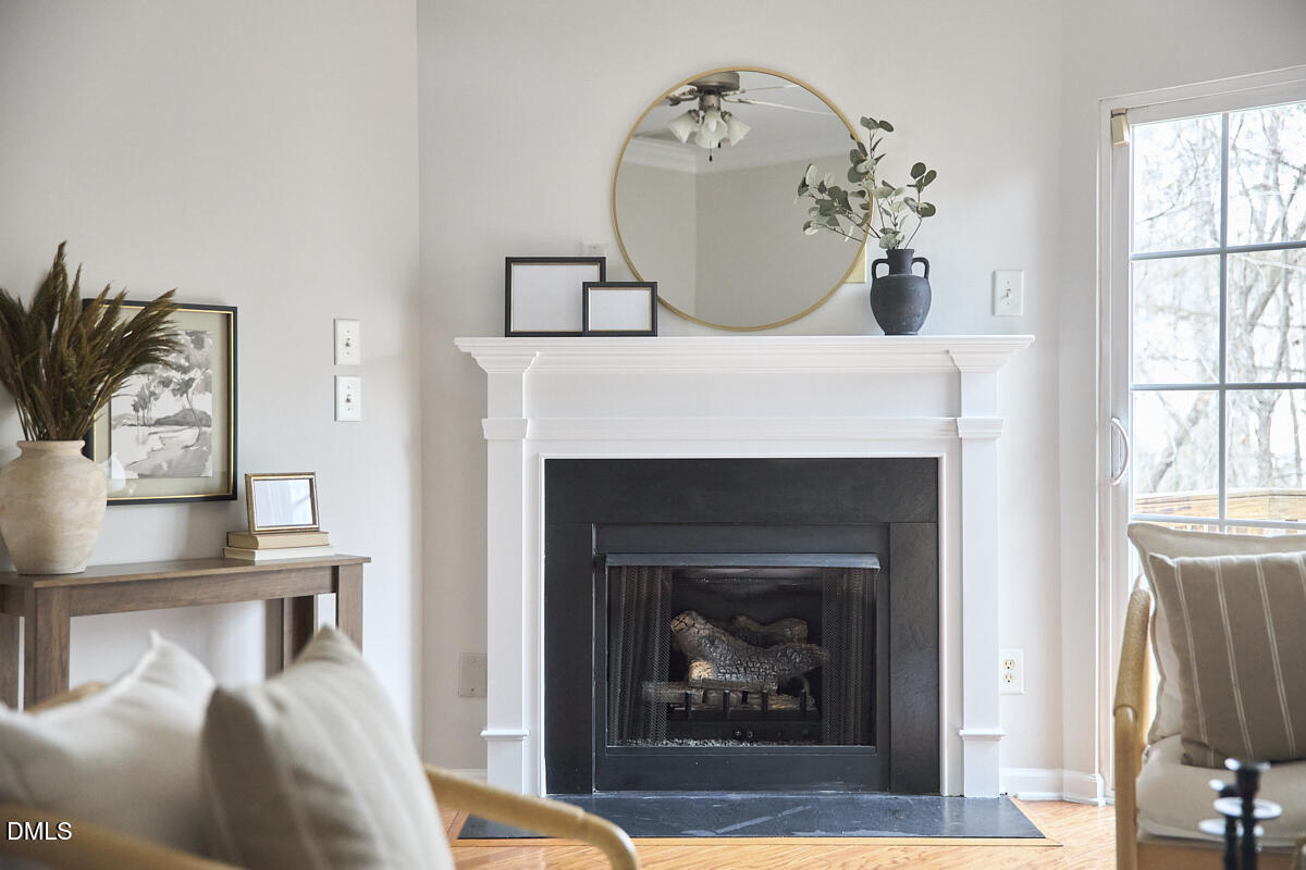 638 Cupola Drive Raleigh, NC 27603 - Photo 20 of 43 a living room with furniture and a fireplace