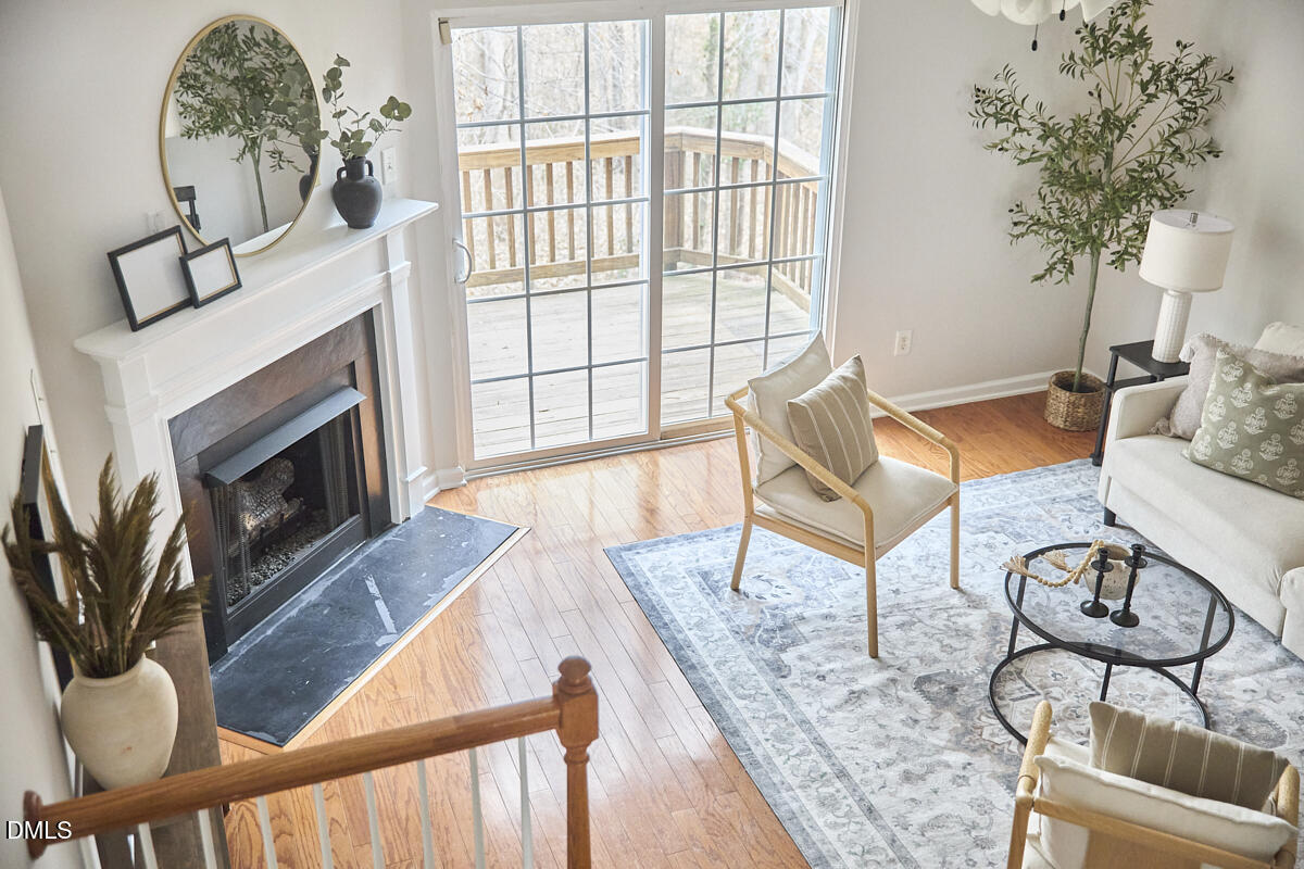 638 Cupola Drive Raleigh, NC 27603 - Photo 23 of 43 a living room with furniture and a fireplace