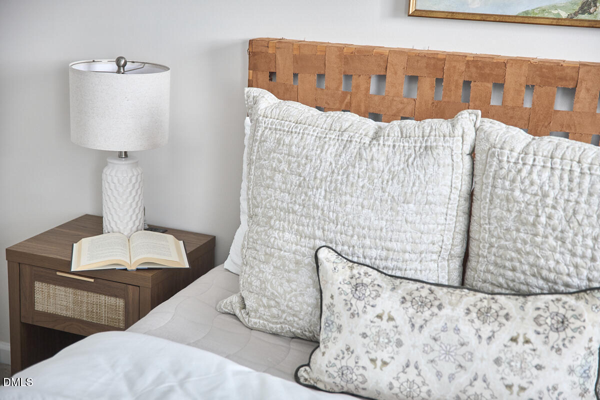 638 Cupola Drive Raleigh, NC 27603 - Photo 29 of 43 a bed room with a bed and a couch