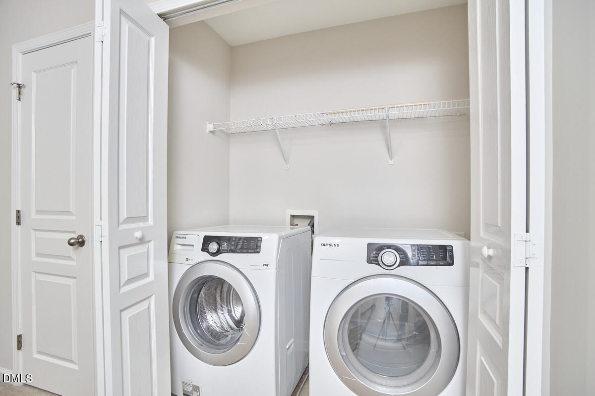 638 Cupola Drive Raleigh, NC 27603 - Photo 32 of 43 a utility room with dryer and washer
