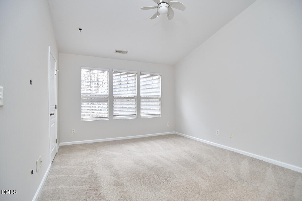638 Cupola Drive Raleigh, NC 27603 - Photo 33 of 43 a view of an empty room with a window