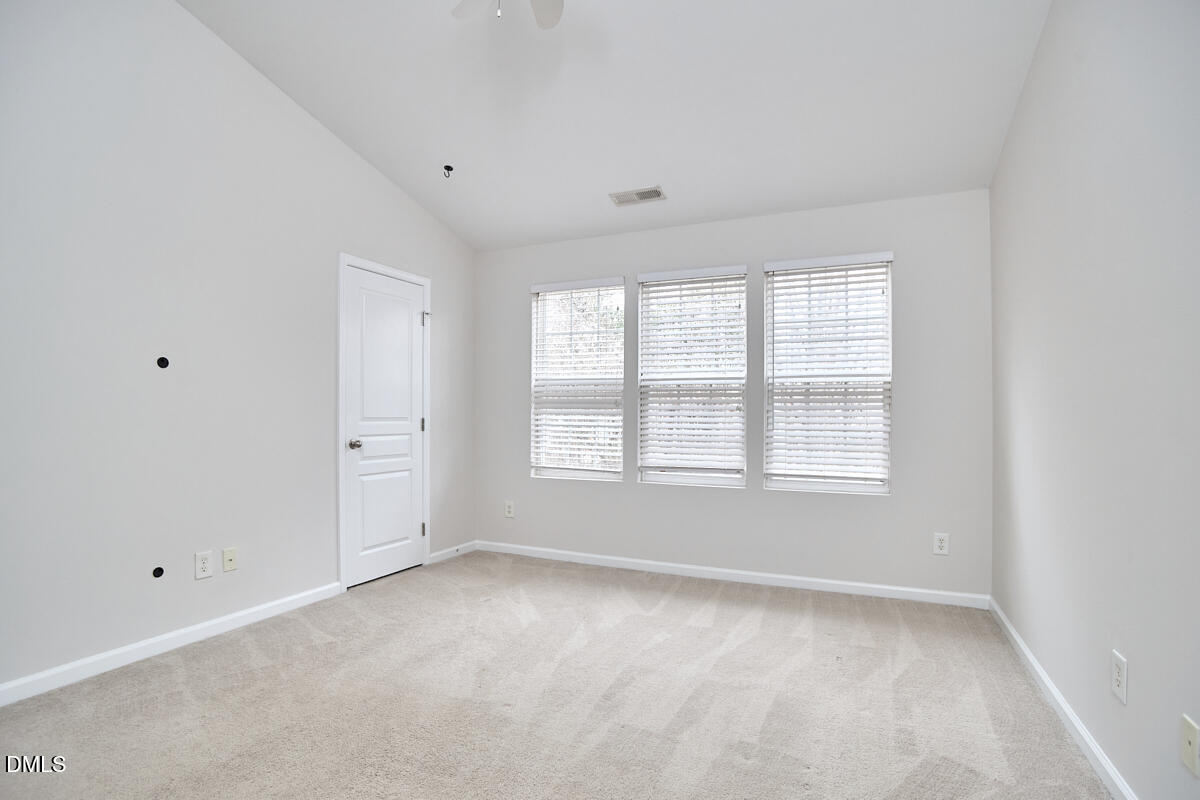 638 Cupola Drive Raleigh, NC 27603 - Photo 34 of 43 a view of an empty room with a window