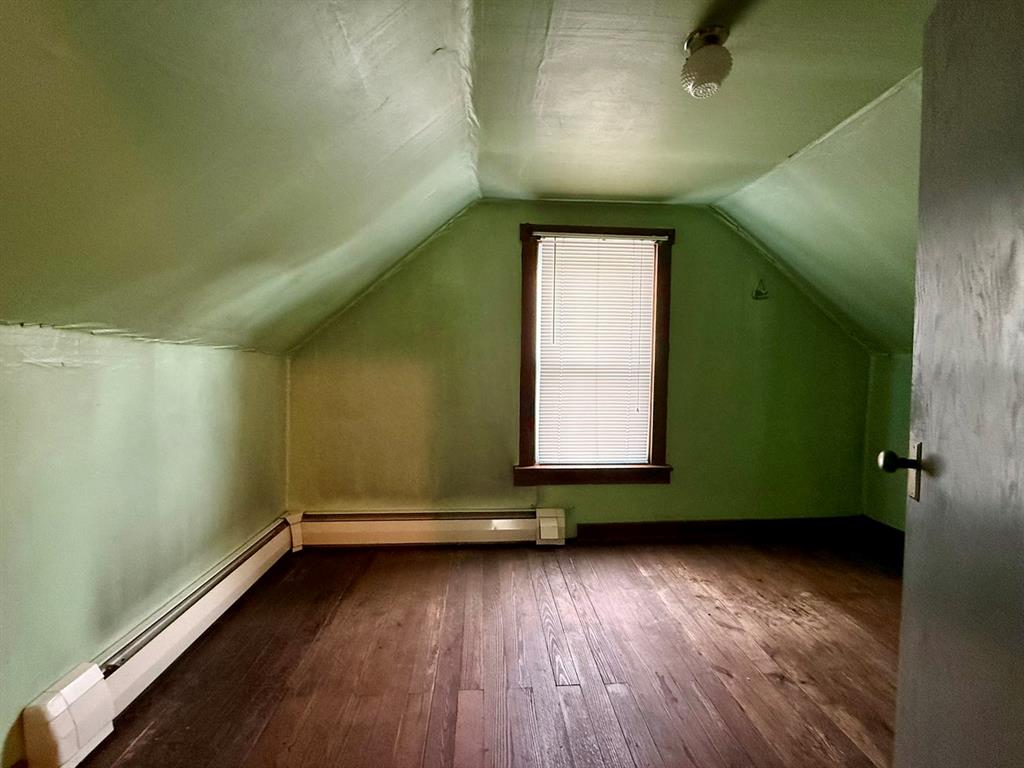 222 Bagdad Road Leechburg, PA 15656 - Photo 21 of 23 a view of room with window and wooden floor