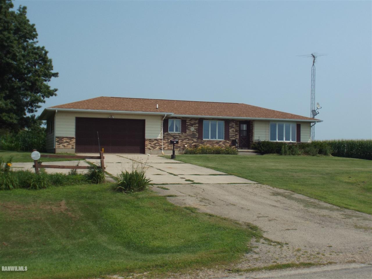 960 West McConnell Road Freeport, IL 61032 - Photo 1 of 19 a front view of house with yard