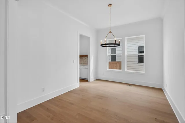 a view of empty room with windows