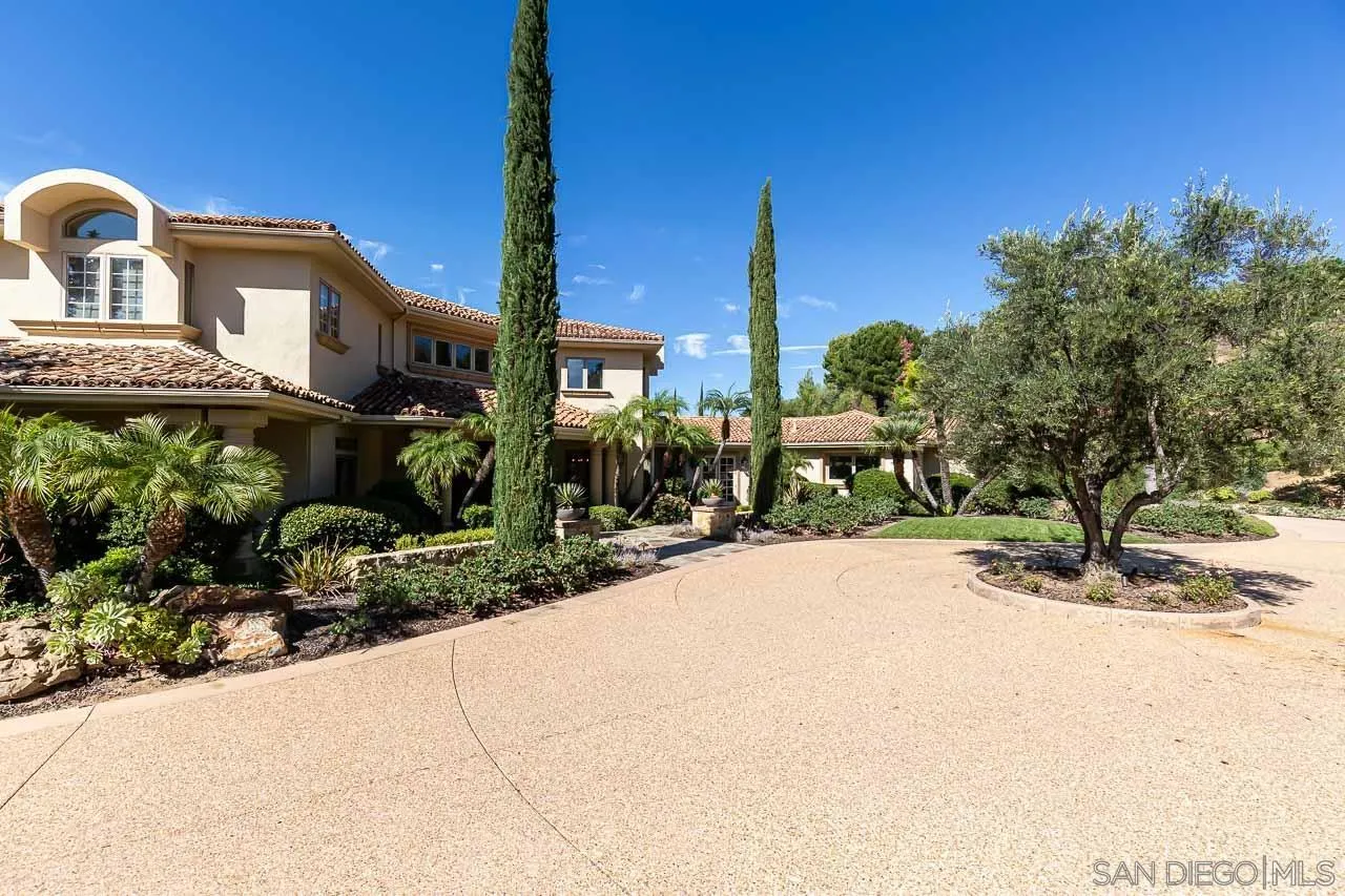 14440 Ridge Ranch Road Valley Center, CA 92082 - Photo 13 of 74 a front view of a house with garden