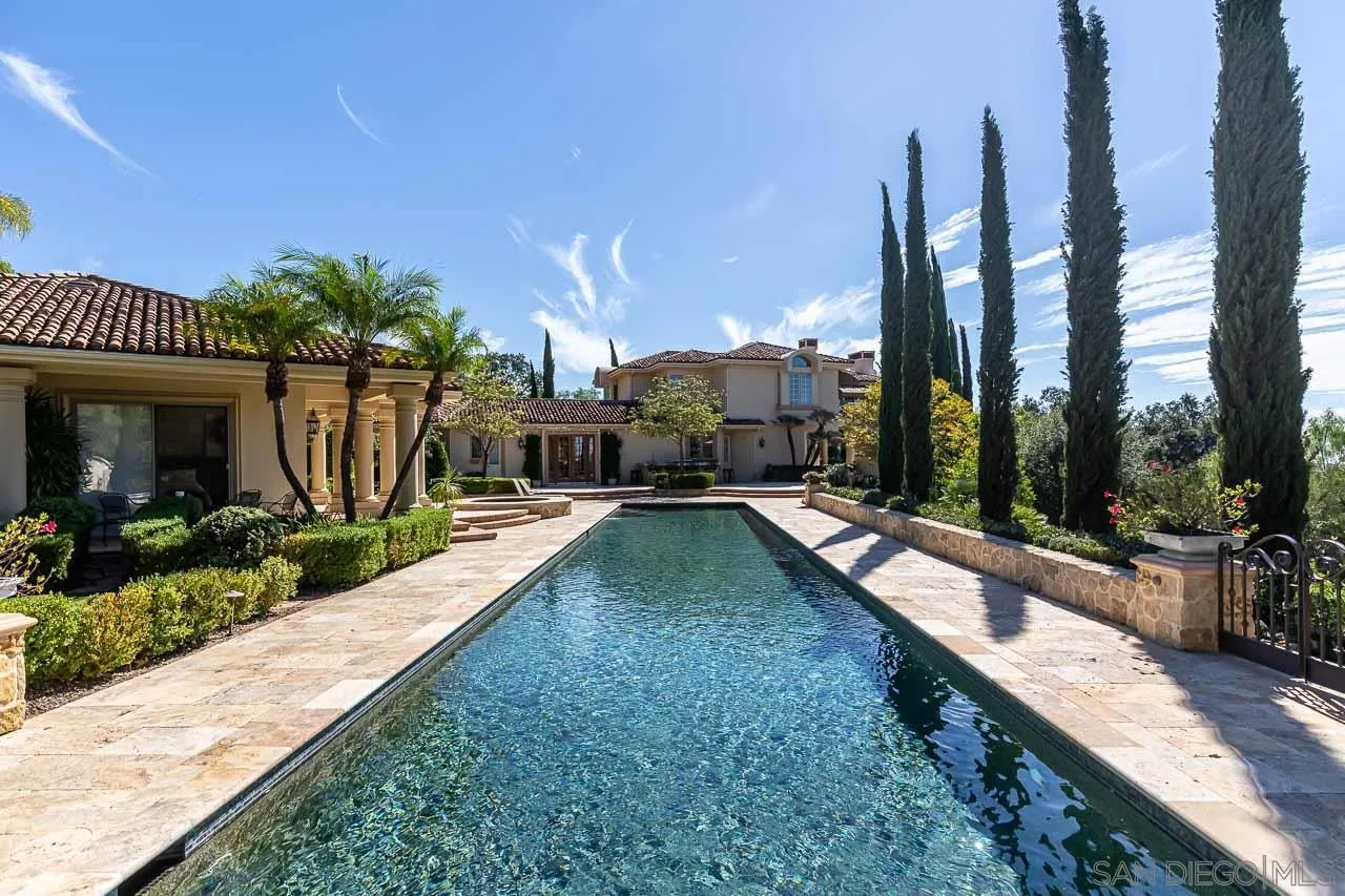 14440 Ridge Ranch Road Valley Center, CA 92082 - Photo 56 of 74 a view of a house with swimming pool and sitting area