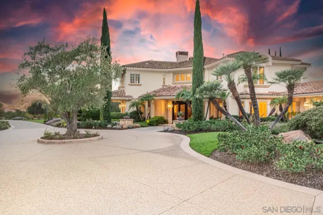 a view of a swimming pool with a lounge chair
