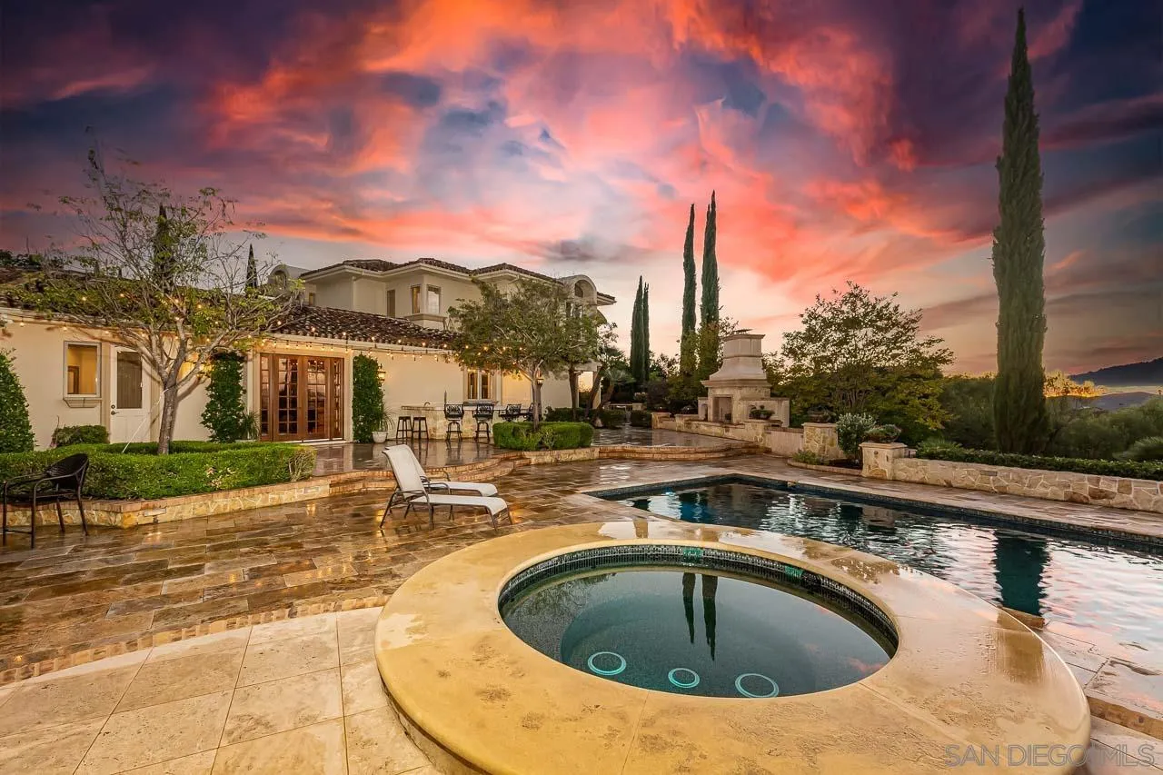 14440 Ridge Ranch Road Valley Center, CA 92082 - Photo 9 of 74 a view of a swimming pool with a lounge chair