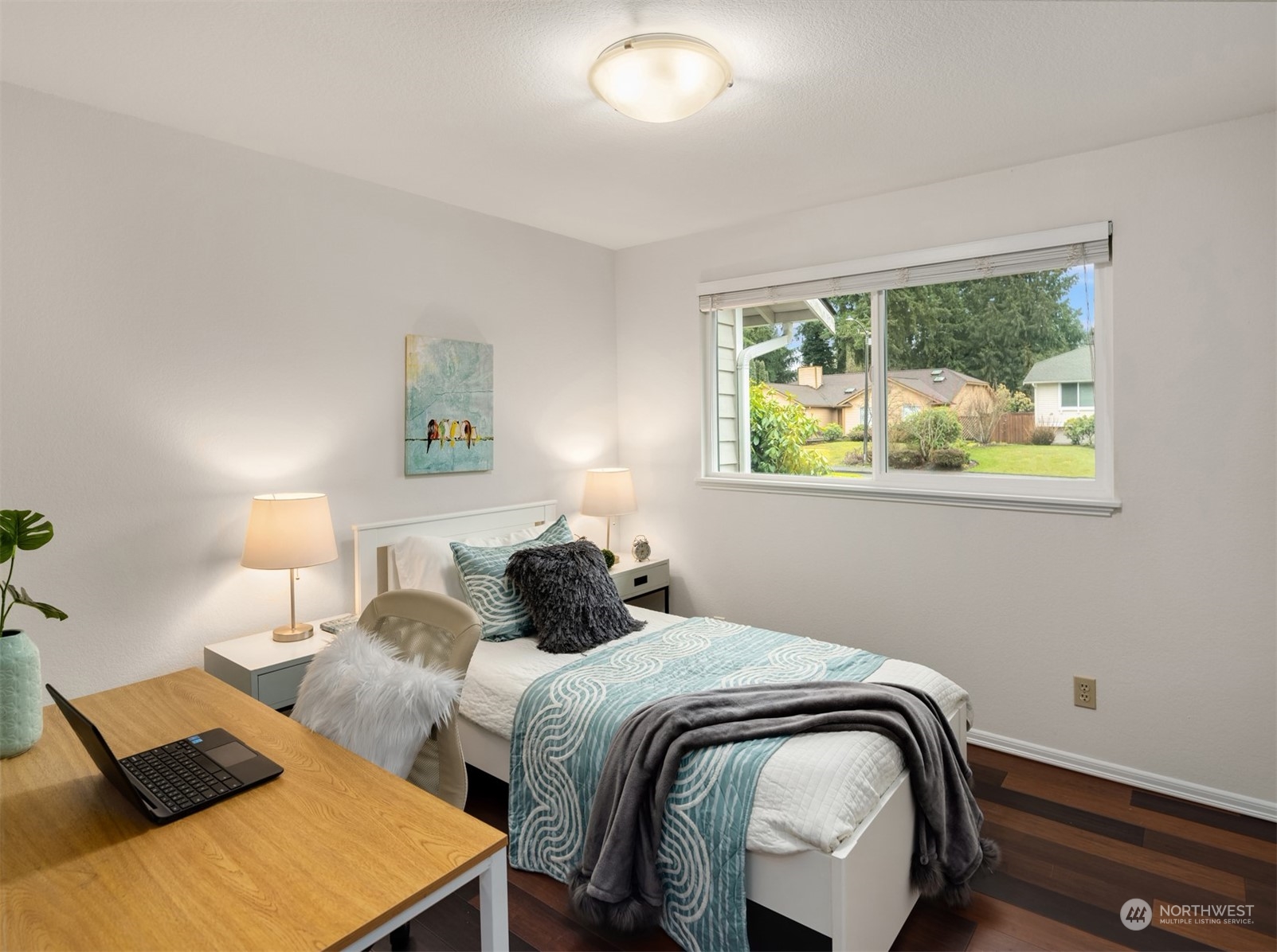 22327 19th Avenue Southeast Bothell, WA 98021 - Photo 12 of 22 a bedroom with two beds and a window