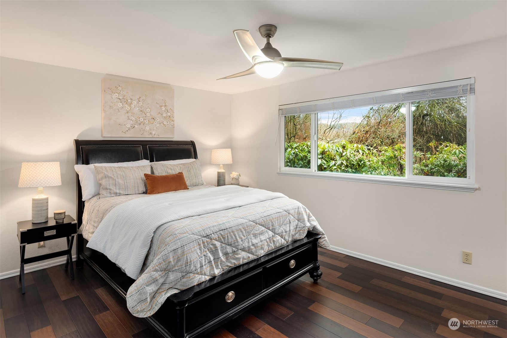 22327 19th Avenue Southeast Bothell, WA 98021 - Photo 14 of 22 a bed sitting in a bedroom next to a window
