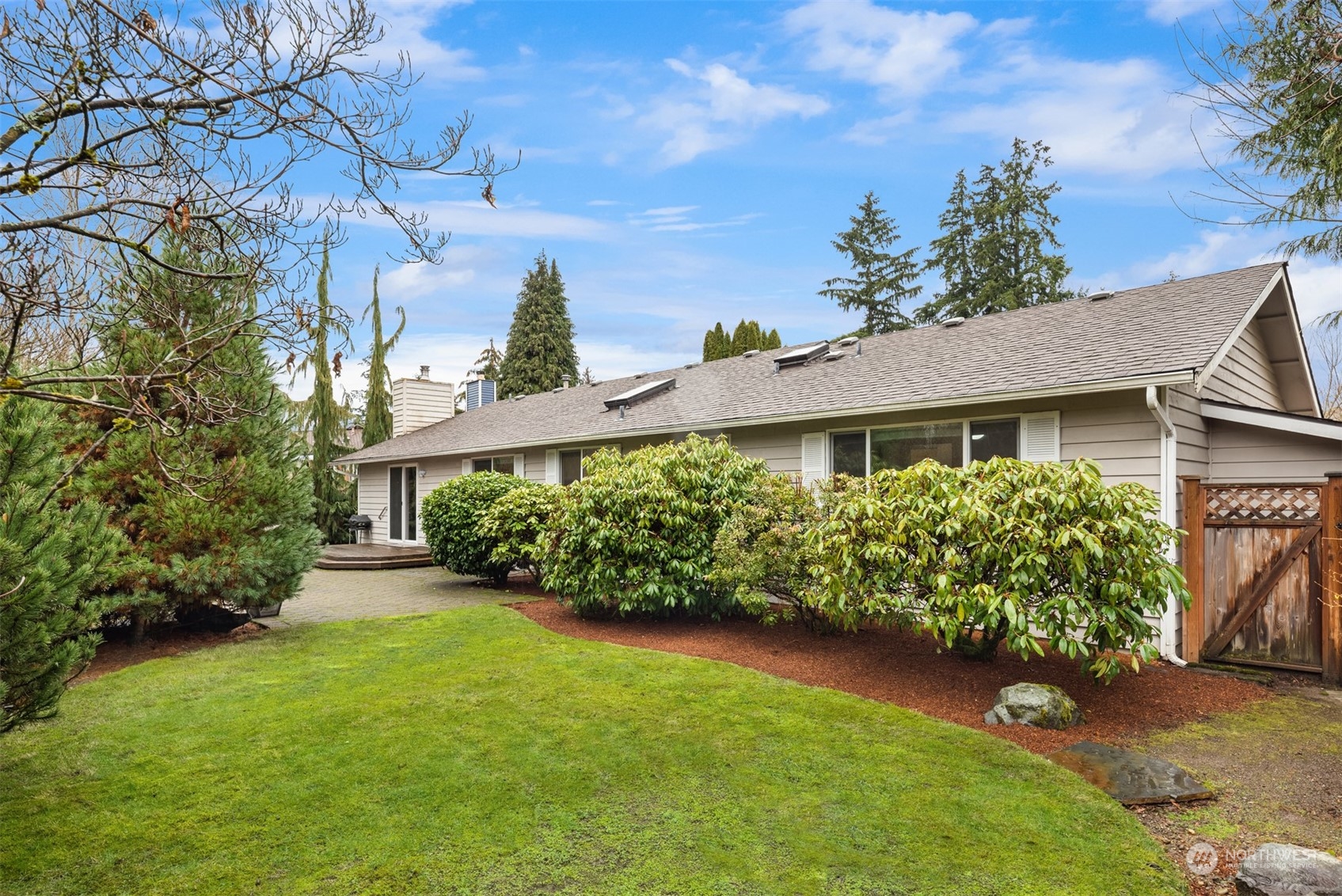 22327 19th Avenue Southeast Bothell, WA 98021 - Photo 21 of 22 a front view of a house with a yard