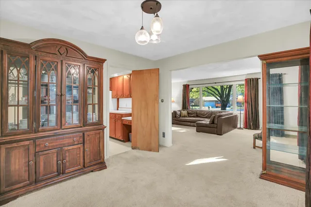 a kitchen with a sink cabinets and appliances