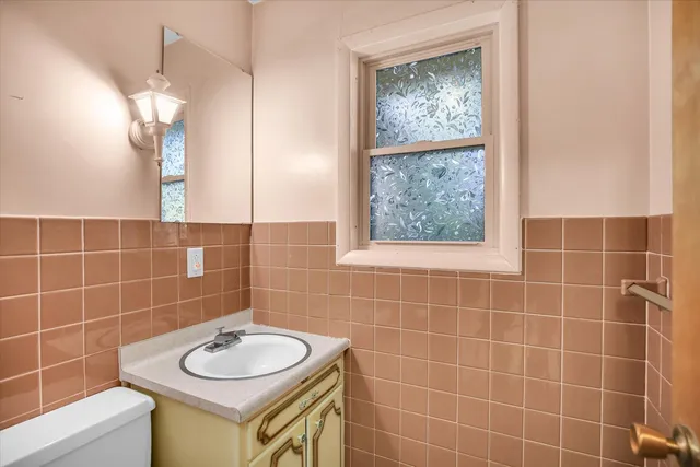 a view of an empty room with a large window