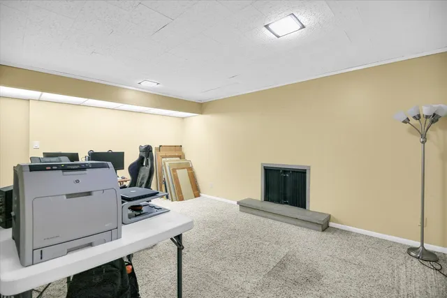 a view of a workspace with furniture