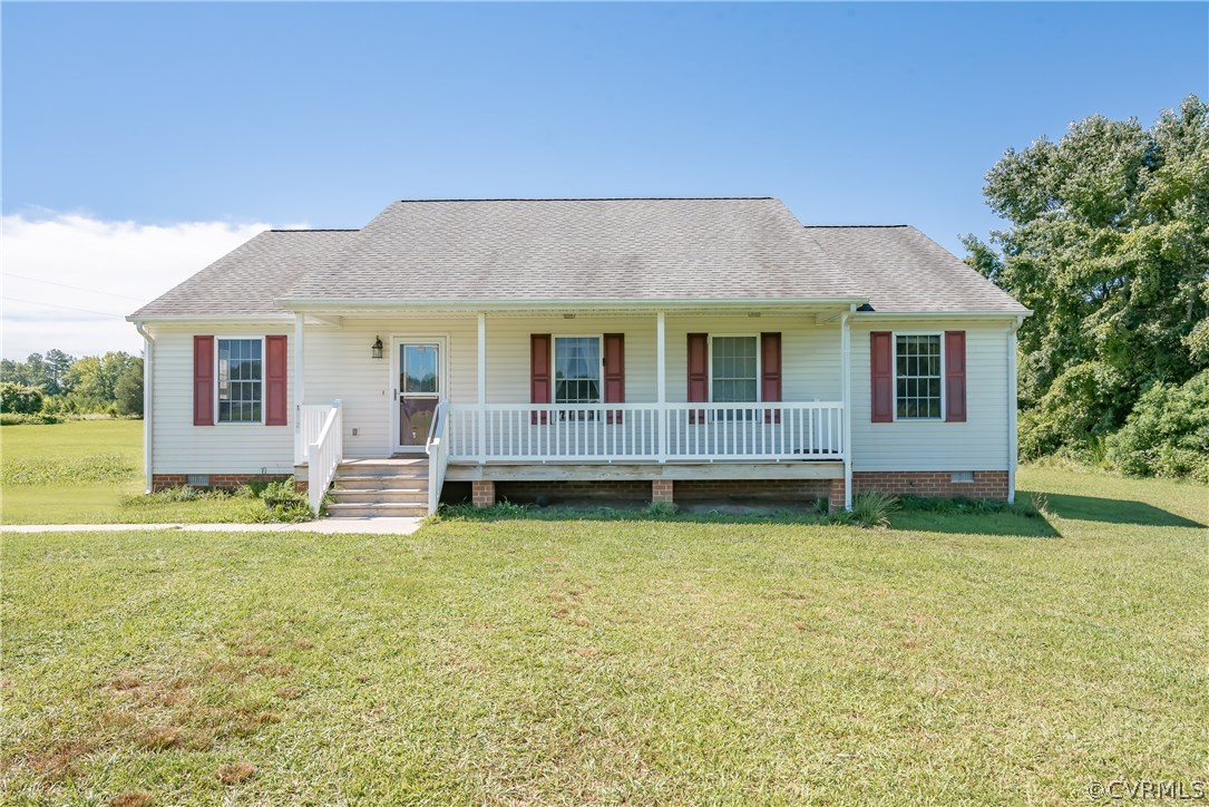 17127 Loving Union Road Disputanta, VA 23842 - Photo 1 of 26 a view of a house with a yard