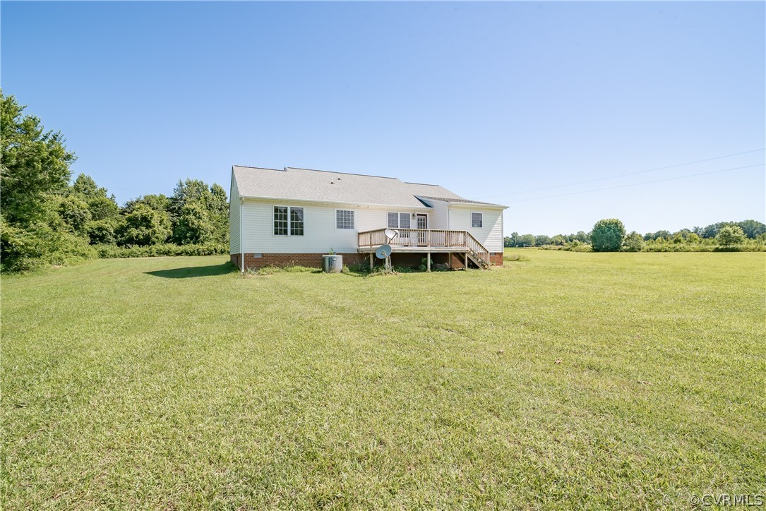 17127 Loving Union Road Disputanta, VA 23842 - Photo 25 of 26 a house with yard in front of it