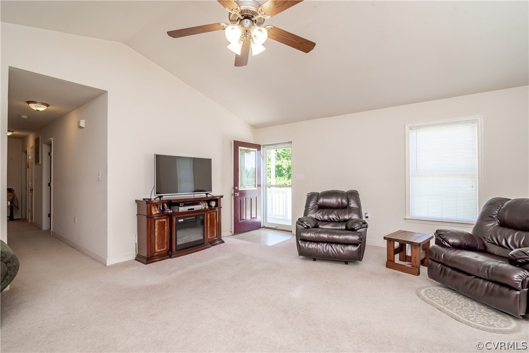 17127 Loving Union Road Disputanta, VA 23842 - Photo 5 of 26 a living room with furniture and a flat screen tv
