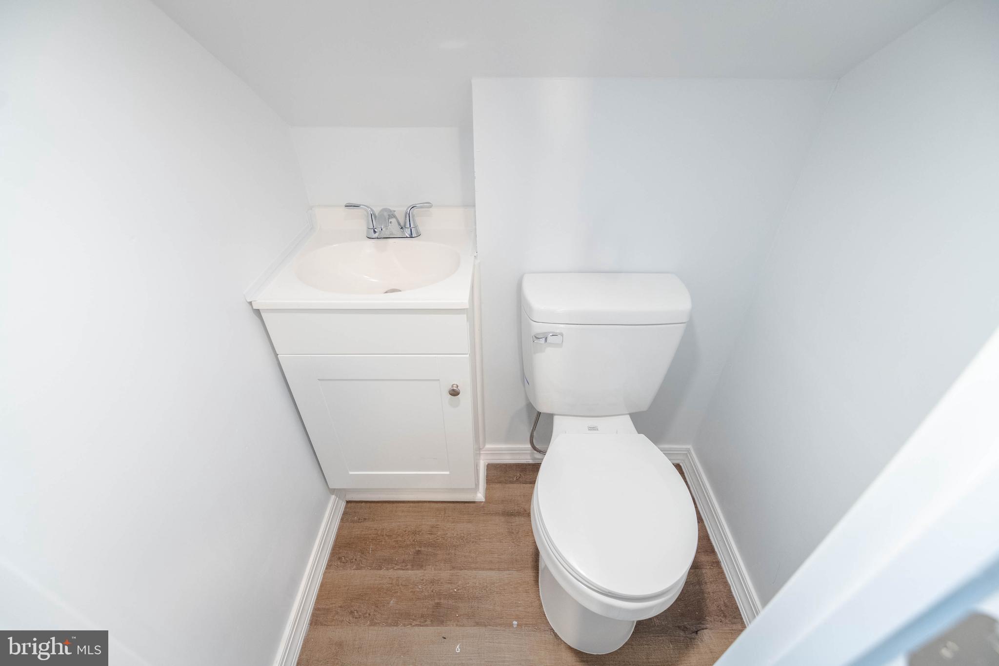 608 Cresswell Road Baltimore, MD 21225 - Photo 35 of 53 Second Floor Half Bath