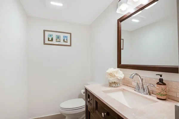 a bathroom with a shower and a toilet