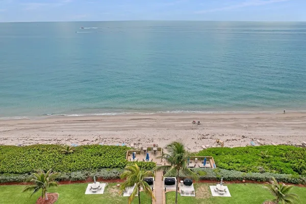 a view of a building with a yard