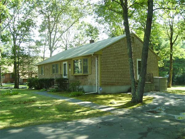 288 Mill Road Fairhaven, MA 02719 - Photo 1 of 22 a view of a house with a yard