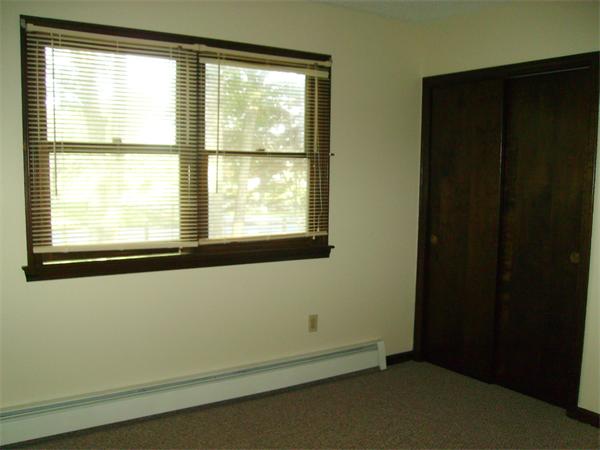288 Mill Road Fairhaven, MA 02719 - Photo 16 of 22 a view of an empty room with a window