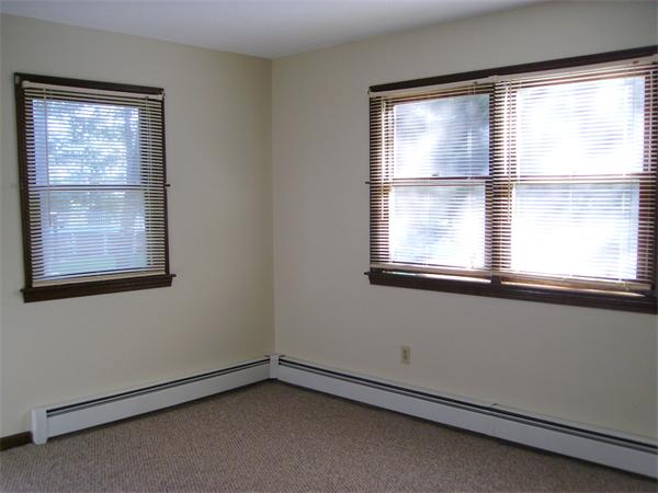 288 Mill Road Fairhaven, MA 02719 - Photo 17 of 22 a view of an empty room with a window