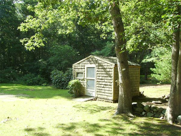 288 Mill Road Fairhaven, MA 02719 - Photo 5 of 22 a view of a house with a yard