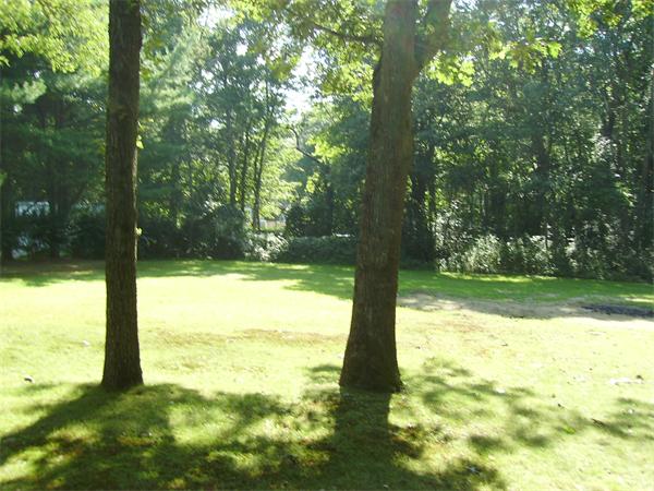 288 Mill Road Fairhaven, MA 02719 - Photo 7 of 22 a view of an ocean from a yard