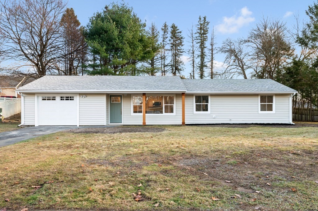 a house with trees in the background