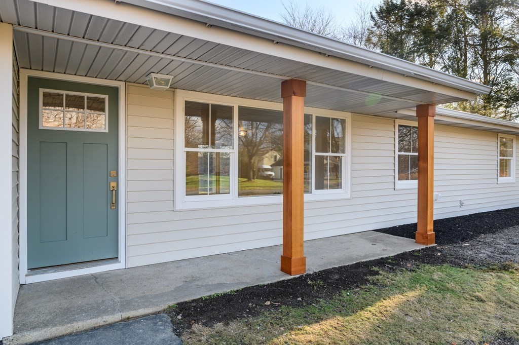 27 Trinity Street Danvers, MA 01923 - Photo 2 of 27 a front view of a house with garden