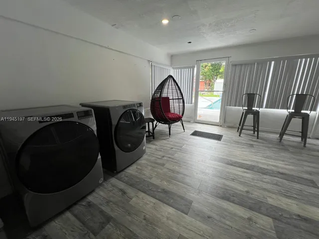 a view of a park with large trees