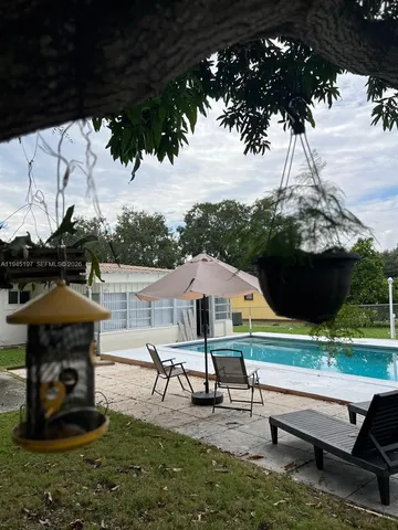 a bedroom with a bed and a walk in closet