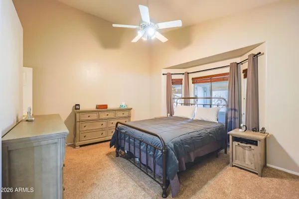 a view of living room with furniture and a window