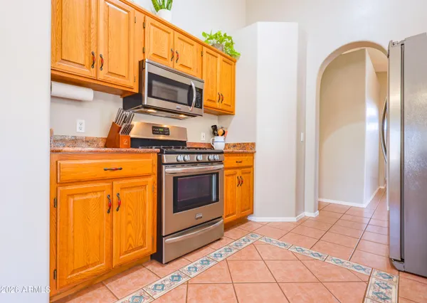 a view of a backyard with sitting area